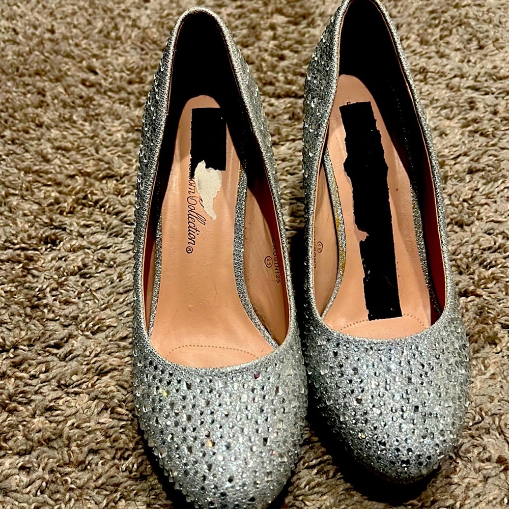 Size 8.5 Women’s dress heals. Only worn once for a wedding